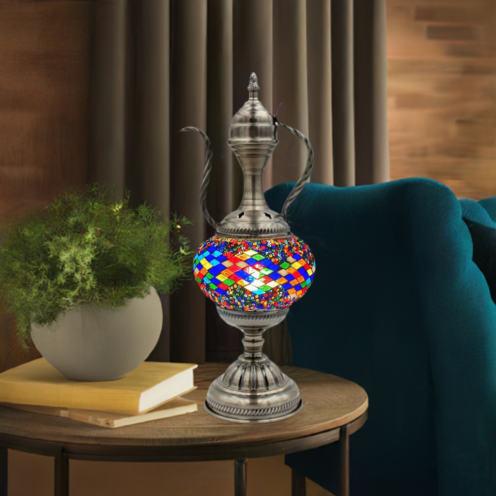 Teapot Treasure mosaic glass table lamp — glowing in a styled room