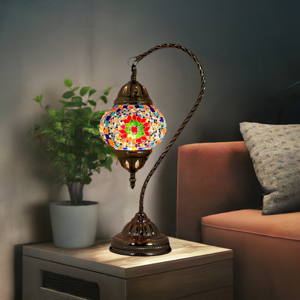 Floral Charm mosaic glass table lamp — glowing in a styled room