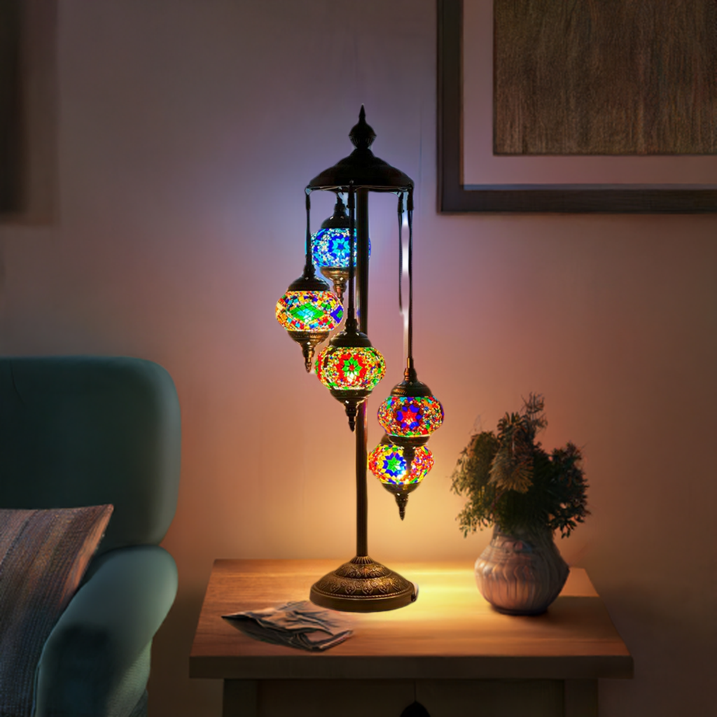 Enchanted Mystic Garden mosaic glass table lamp — on a nightstand
