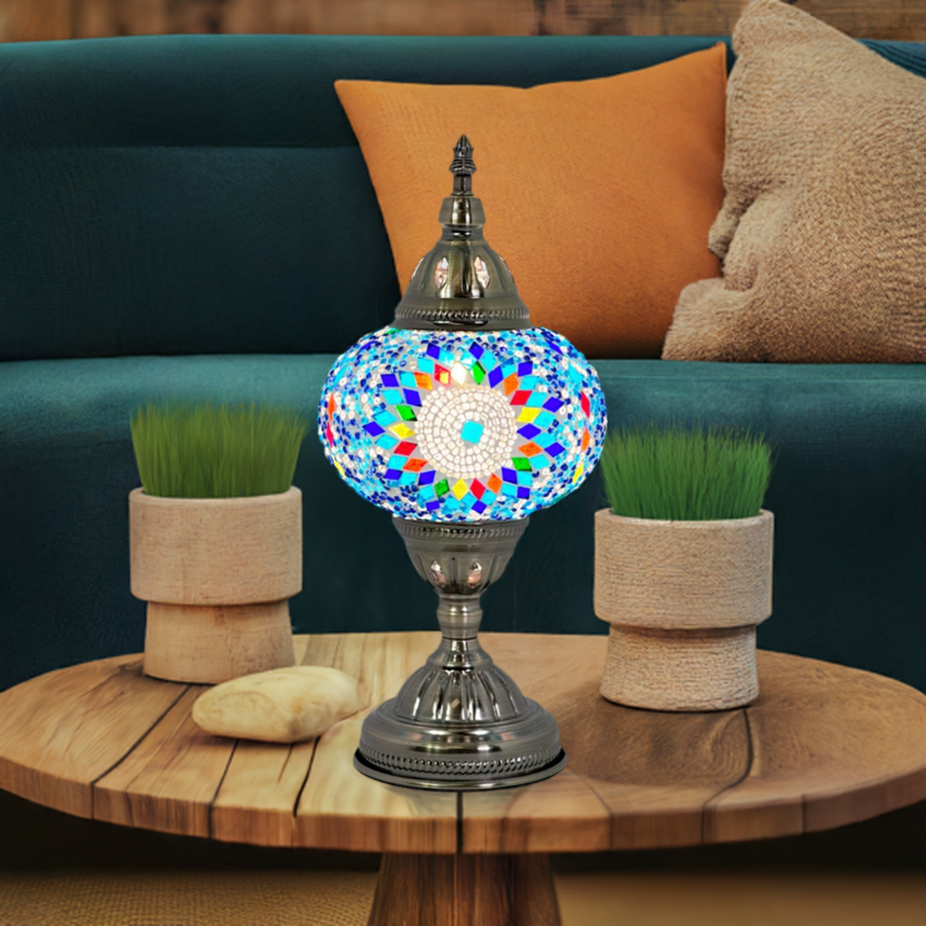 Cold Sunflower Turkish Lamp in Blue mosaic glass table lamp — glowing in a styled room