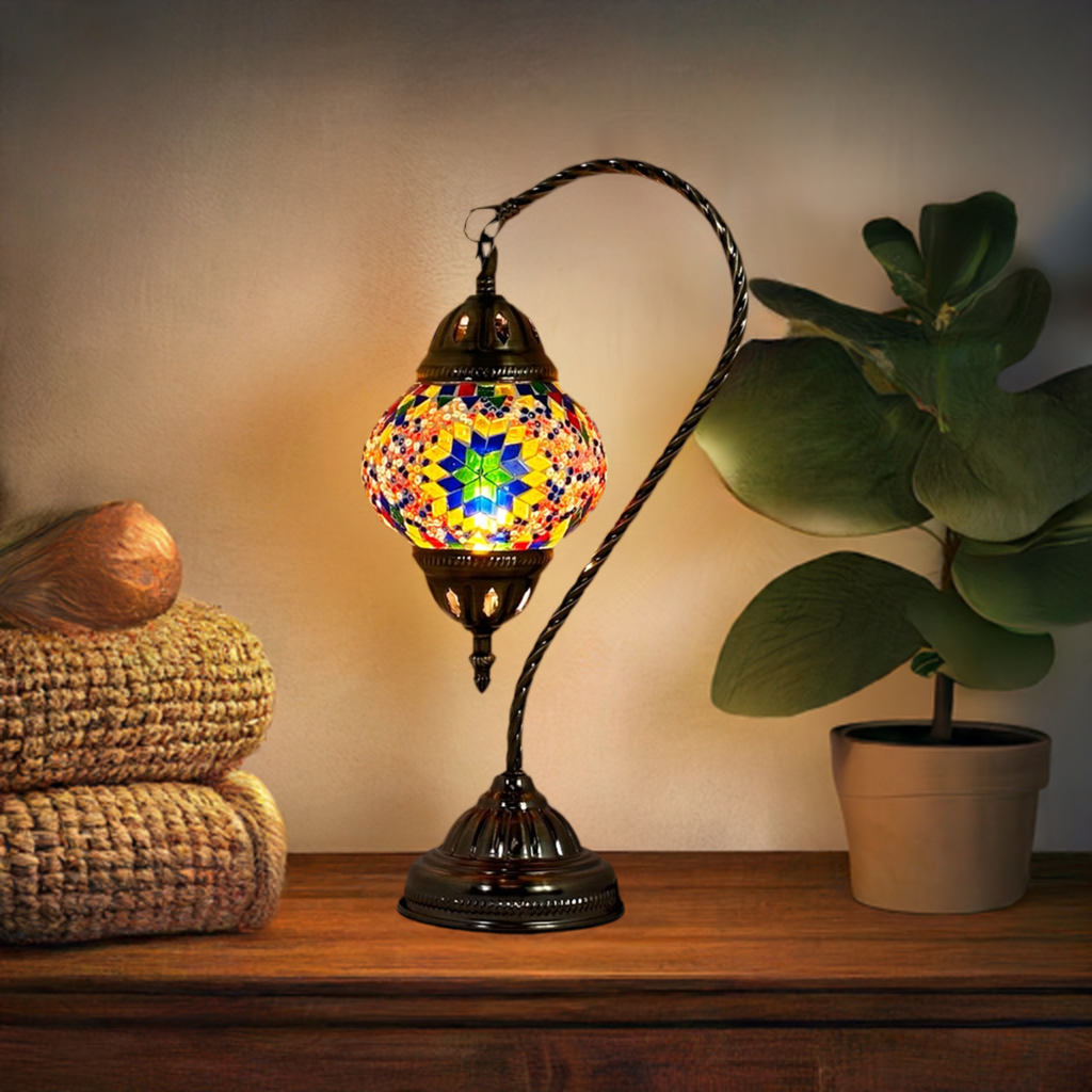 Sunbeam Glow mosaic glass table lamp — glowing in a styled room