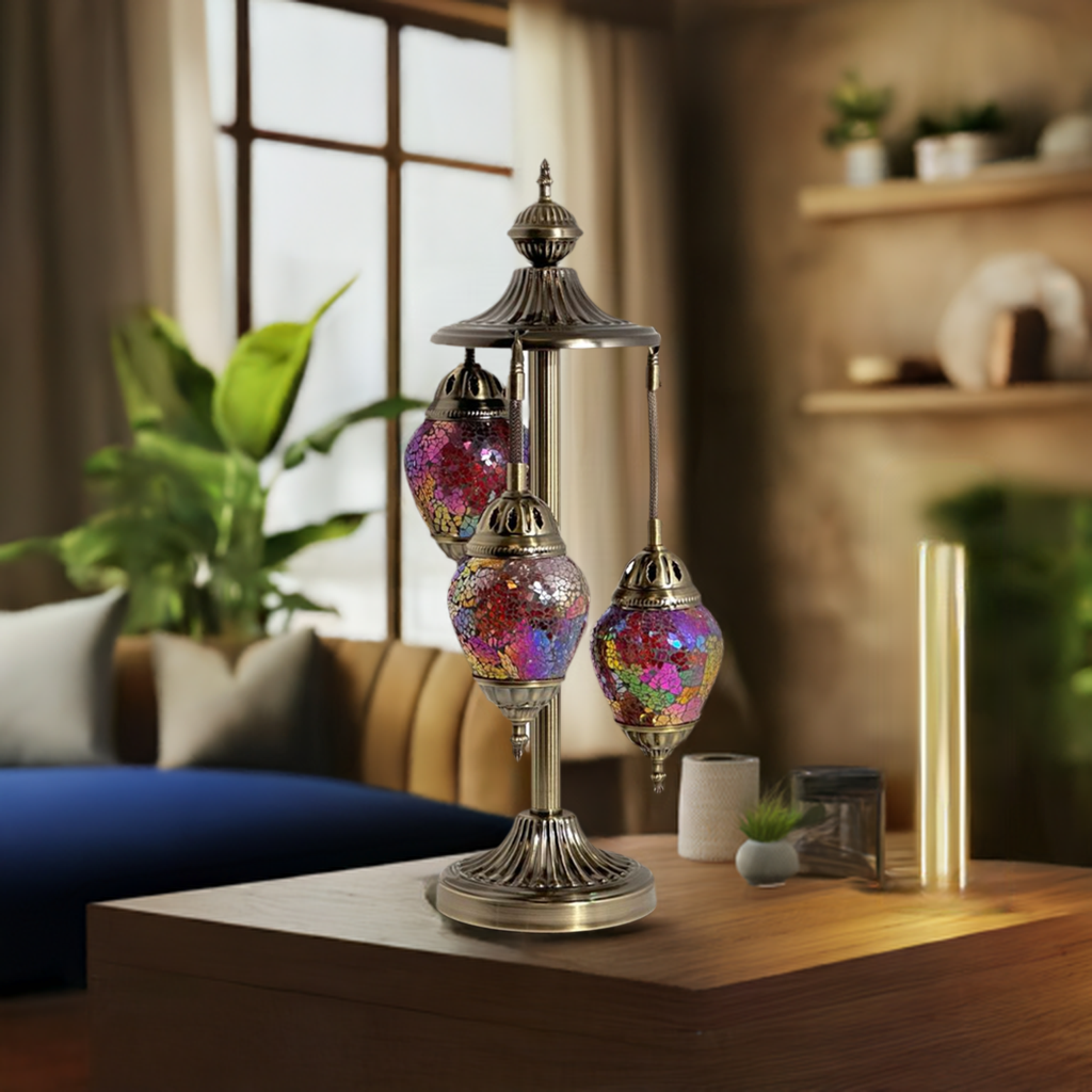Cosmic Red Hues Egg mosaic glass table lamp — on a nightstand