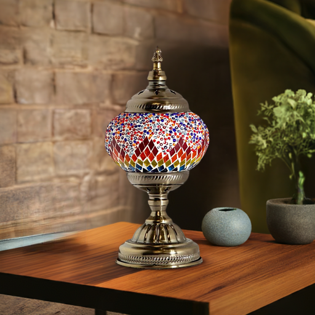 Crimson Spectrum mosaic glass table lamp — on a nightstand