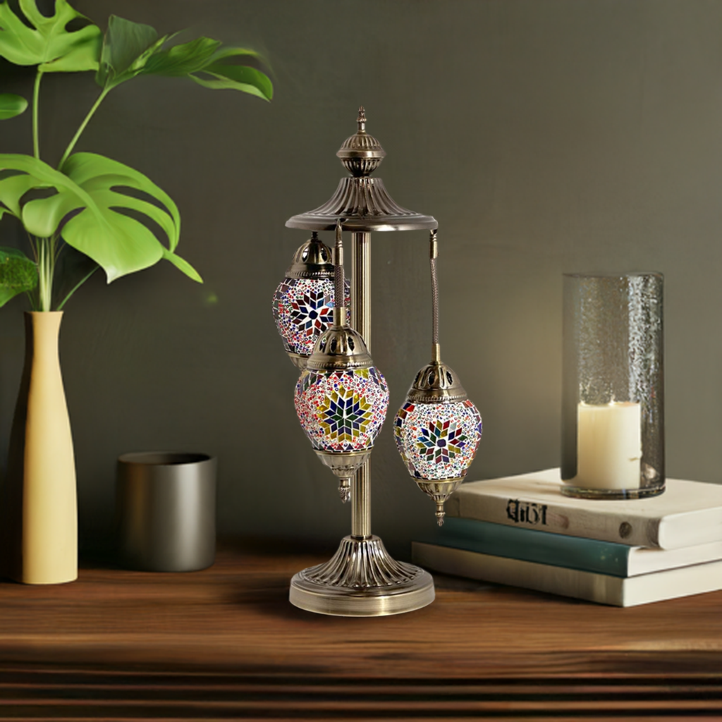 Garden Splendor mosaic glass table lamp — on a nightstand