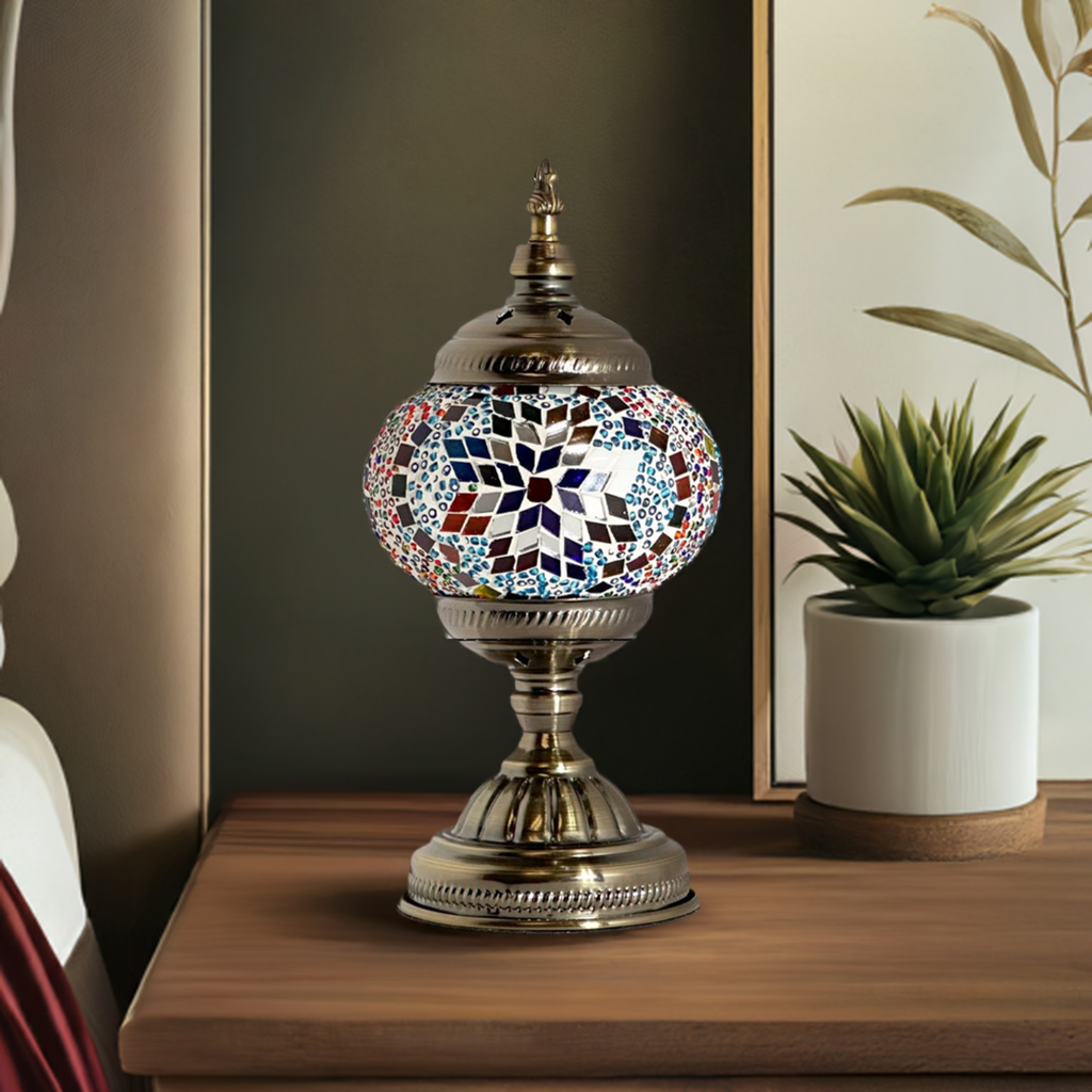 Prismatic Artistry mosaic glass table lamp — on a nightstand