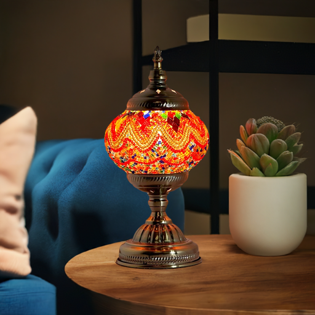Fiery Echoes mosaic glass table lamp — glowing in a styled room