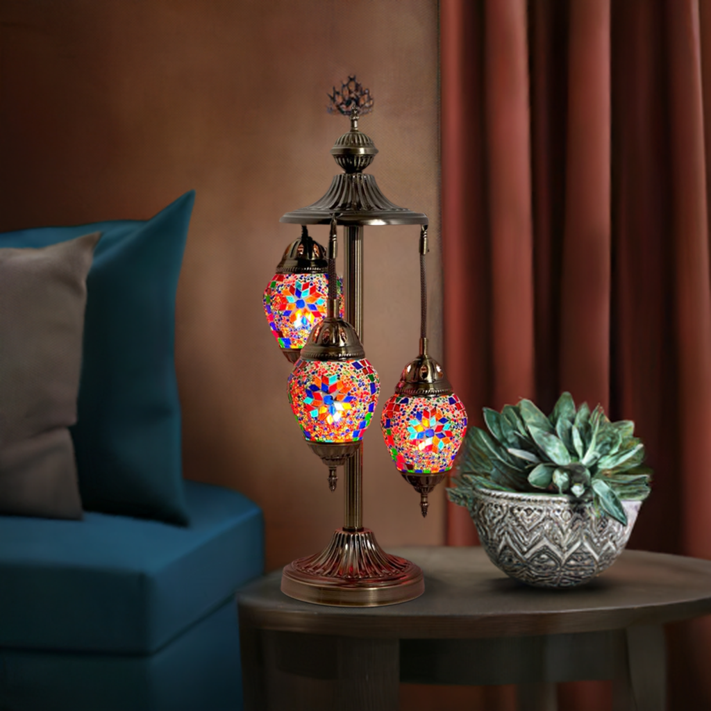 Colorful Trio mosaic glass table lamp — glowing in a styled room