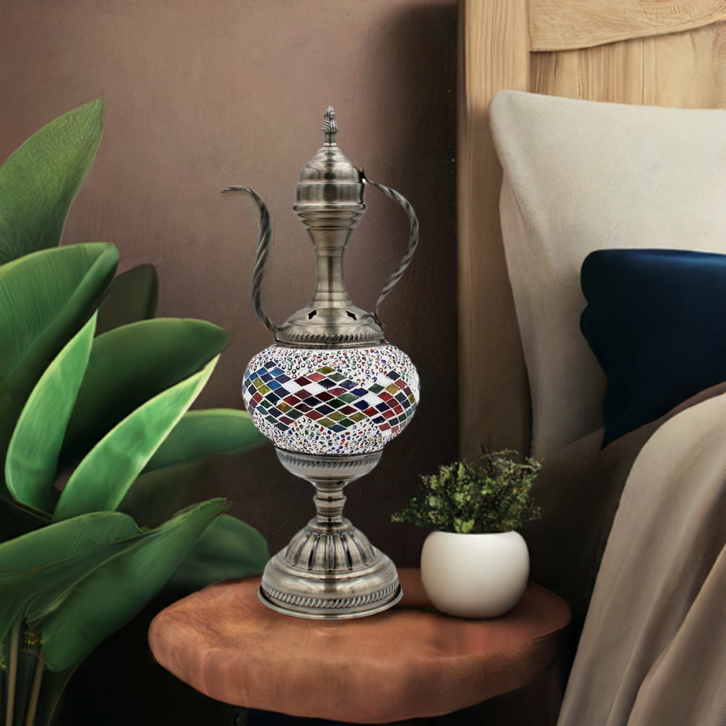 Teapot Treasure mosaic glass table lamp — on a nightstand