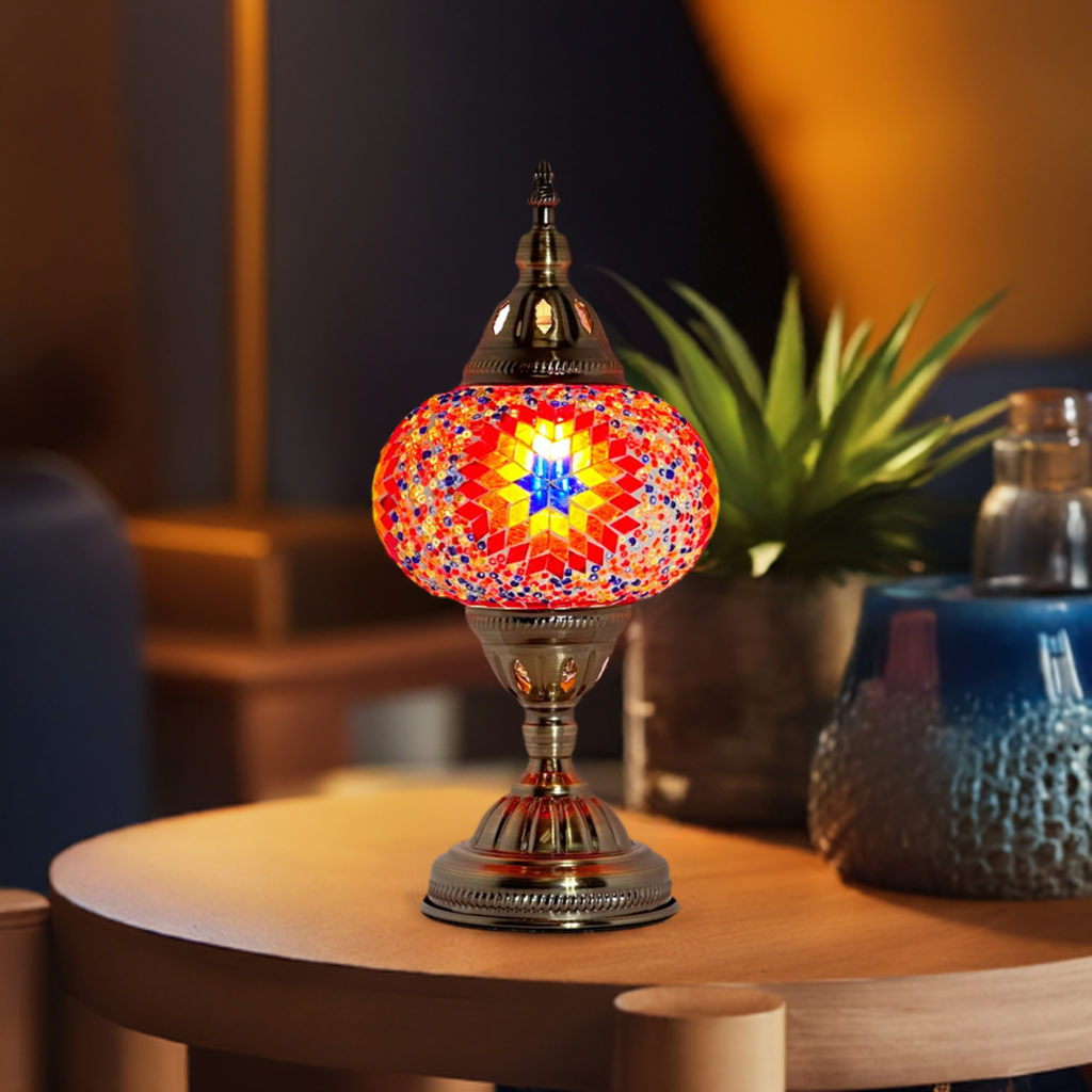 Desert Bloom Mosaic mosaic glass table lamp — glowing in a styled room