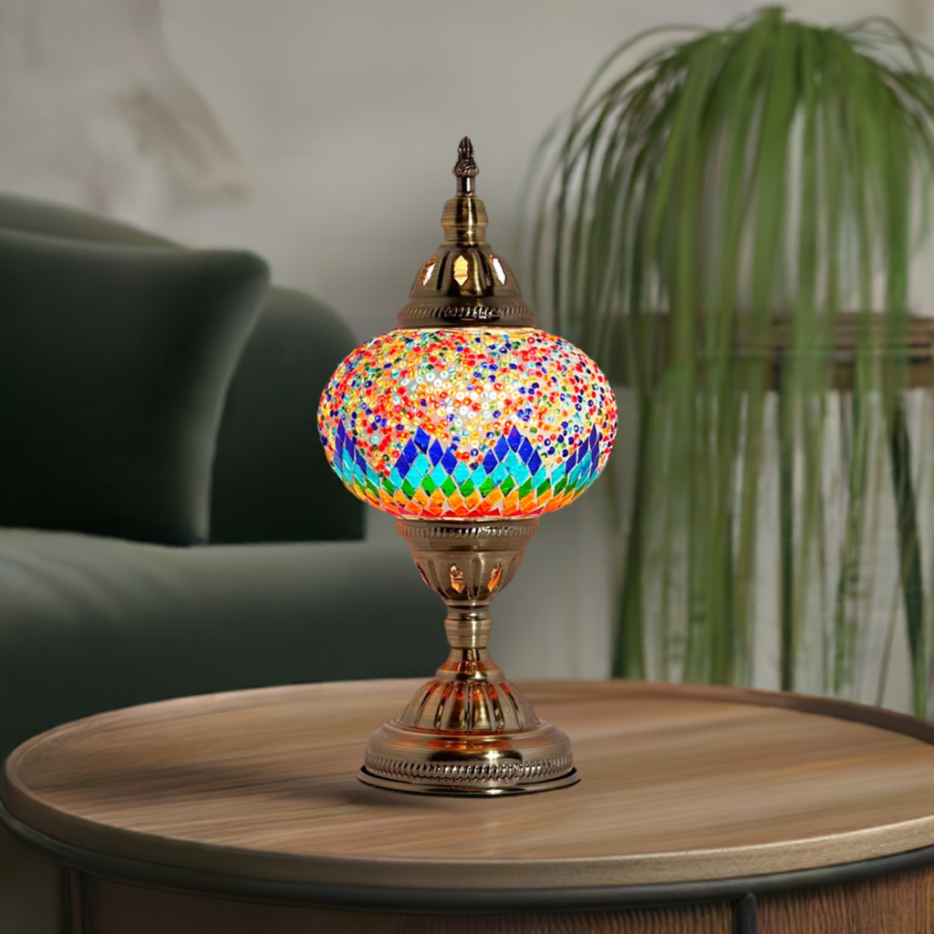 Spectrum Harmony mosaic glass table lamp — glowing in a styled room