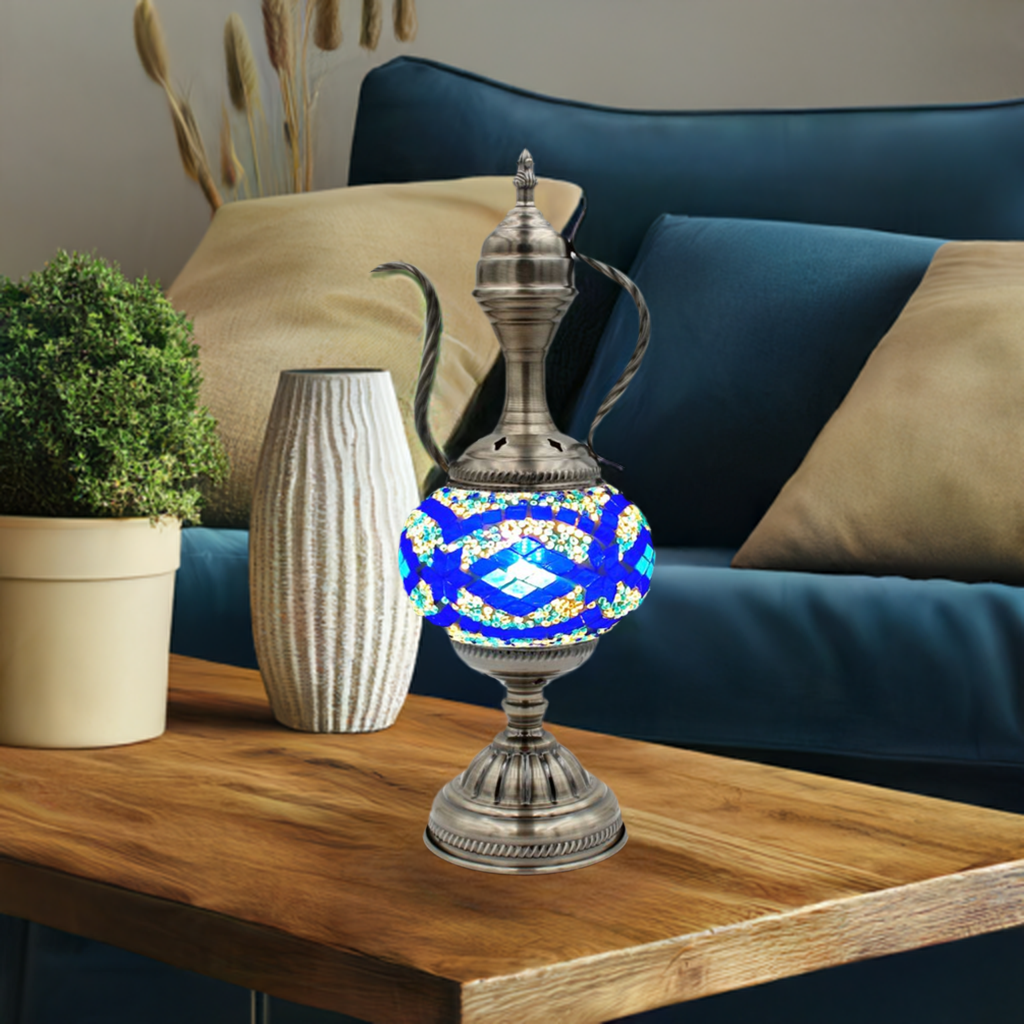 a blue and white vase sitting on top of a table