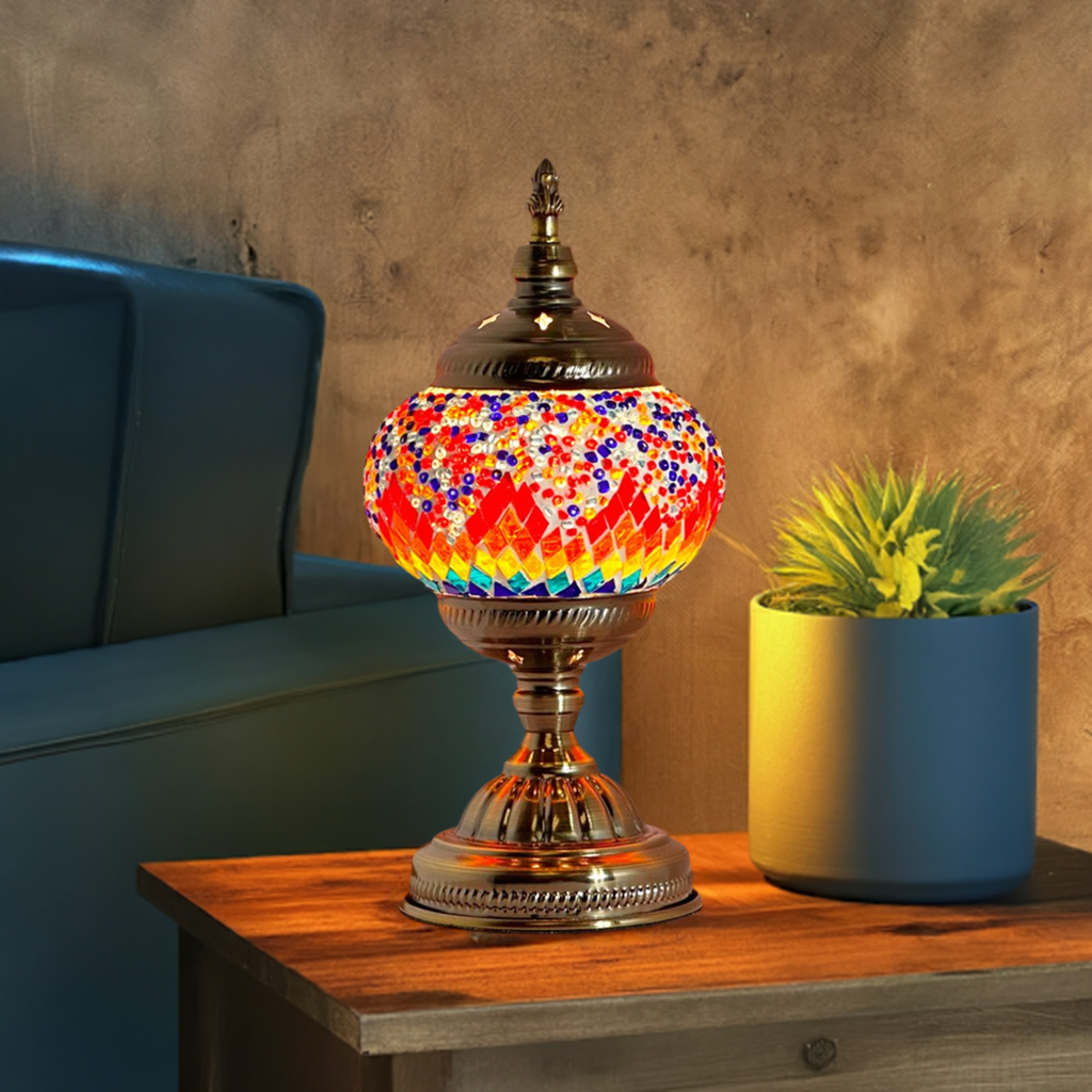 Crimson Spectrum mosaic glass table lamp — glowing in a styled room
