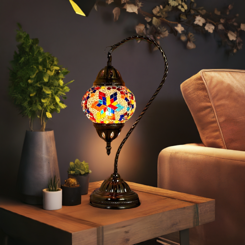 Moroccan Essence mosaic glass table lamp — glowing in a styled room
