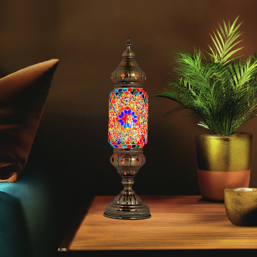 a colorful lamp is lit up on a table