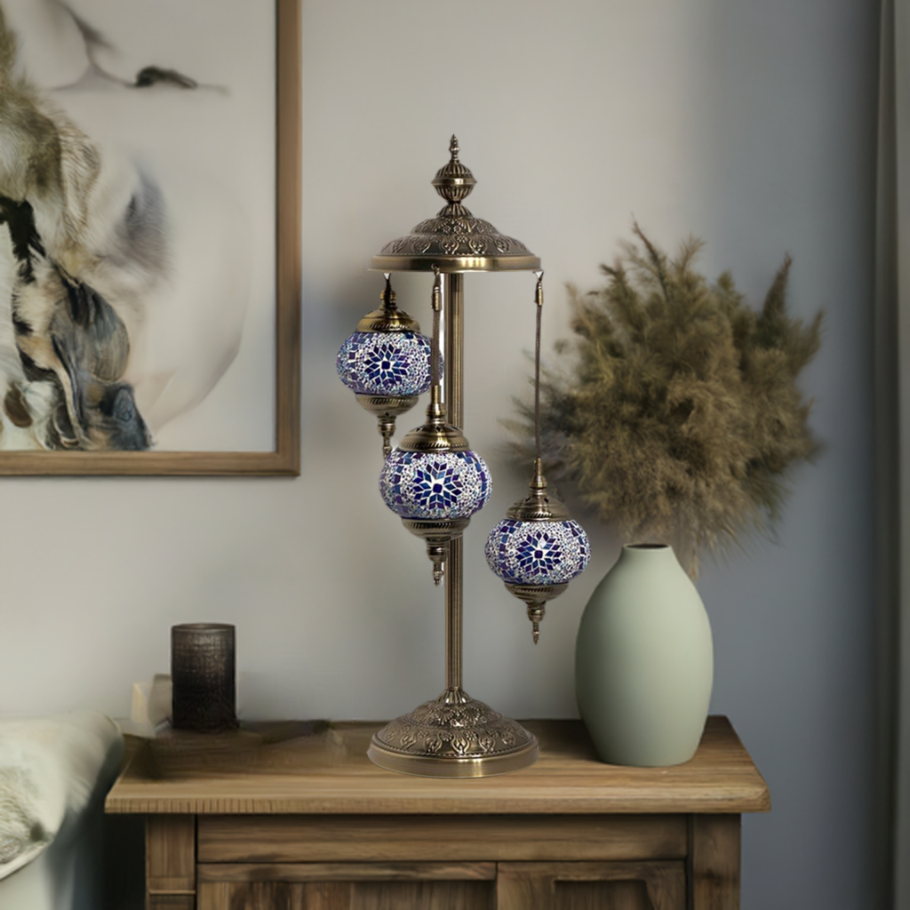 Blue Star Magic mosaic glass table lamp — on a nightstand