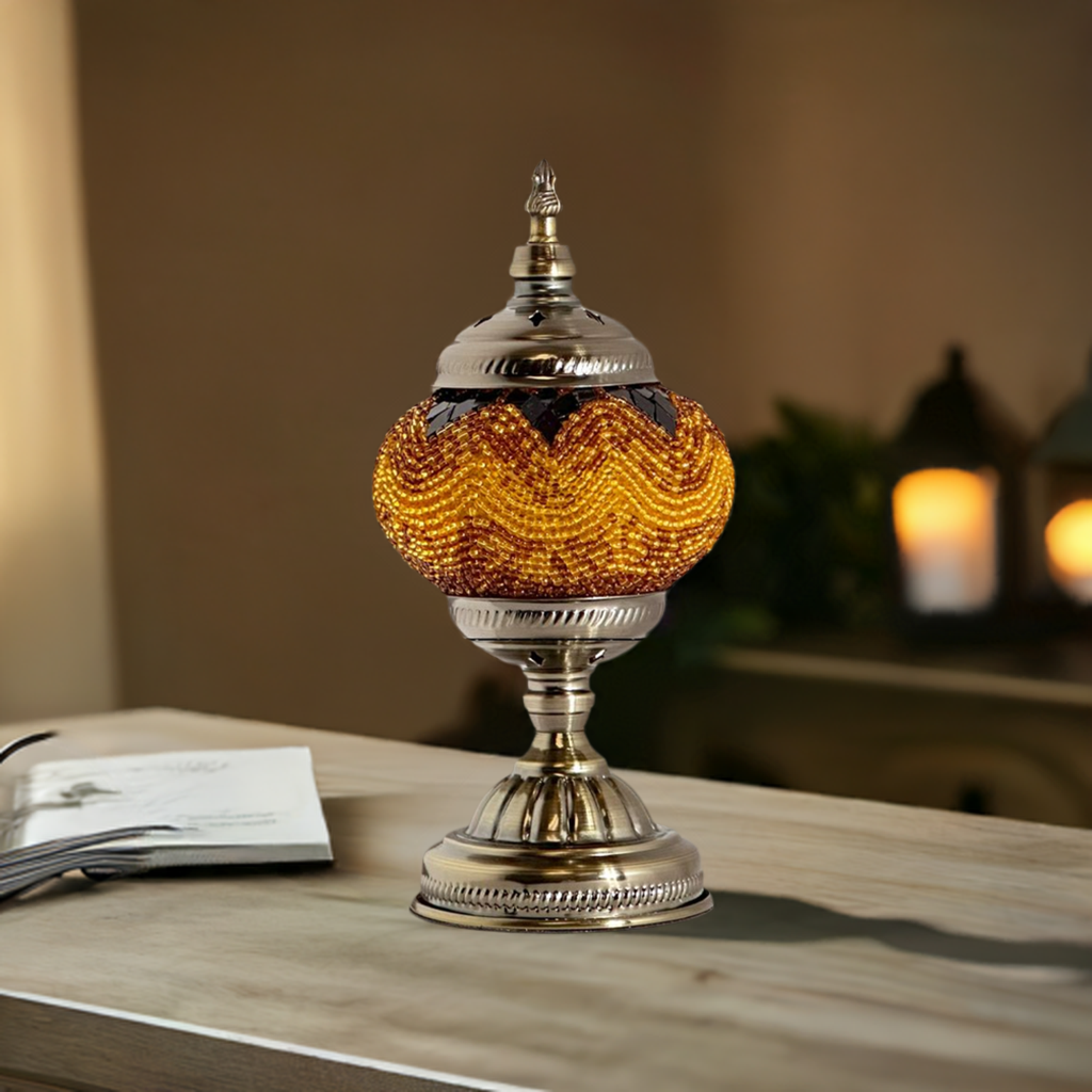 Desert Mirage mosaic glass table lamp — on a nightstand