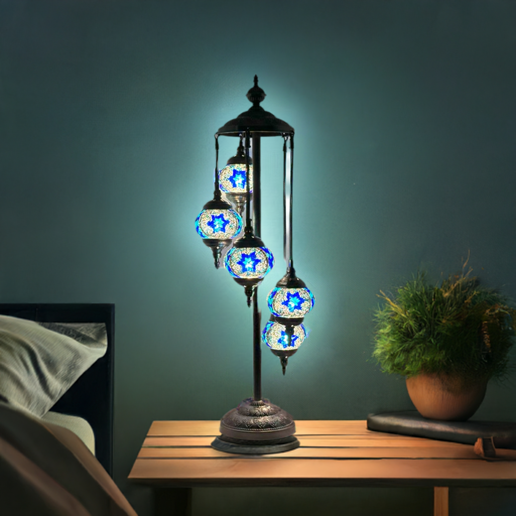 Majestic Blue Turkish Floor Lamp with 5 Mosaic Globes mosaic glass table lamp — on a nightstand