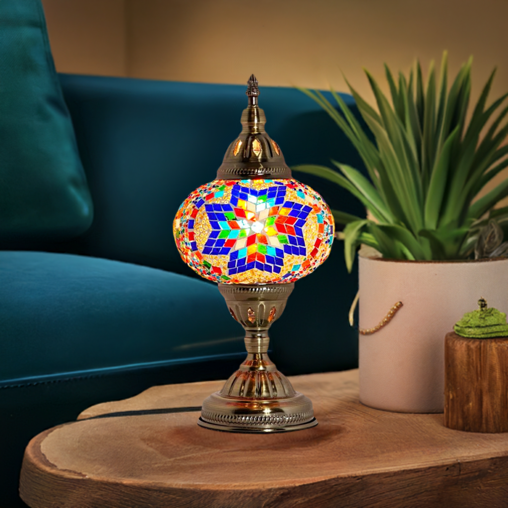 Moroccan Sunset mosaic glass table lamp — glowing in a styled room