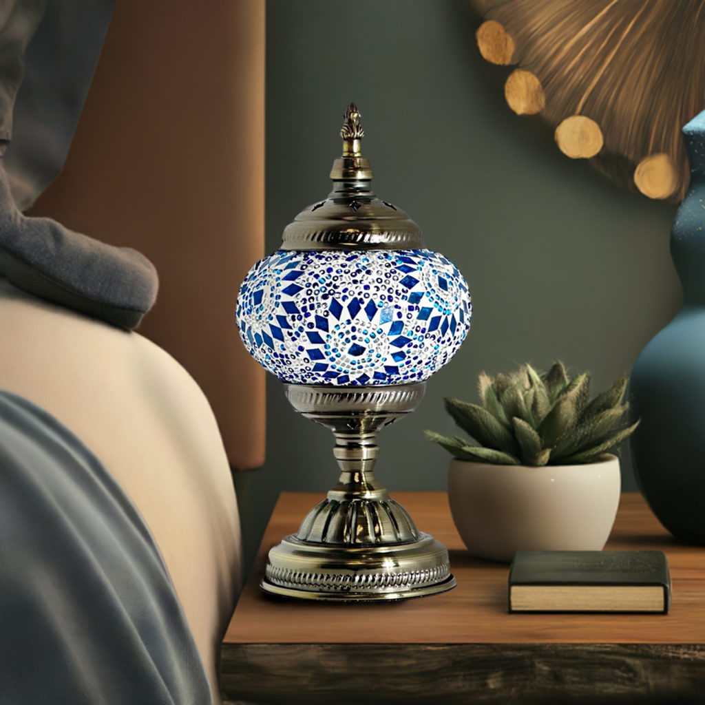 Blue Pearl Fantasy mosaic glass table lamp — on a nightstand