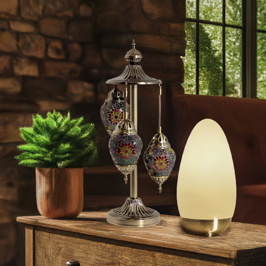 Crimson Bloom Egg mosaic glass table lamp — on a nightstand