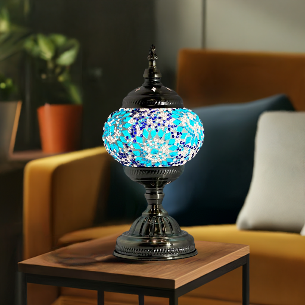 Blue Pearl Fantasy mosaic glass table lamp — glowing in a styled room