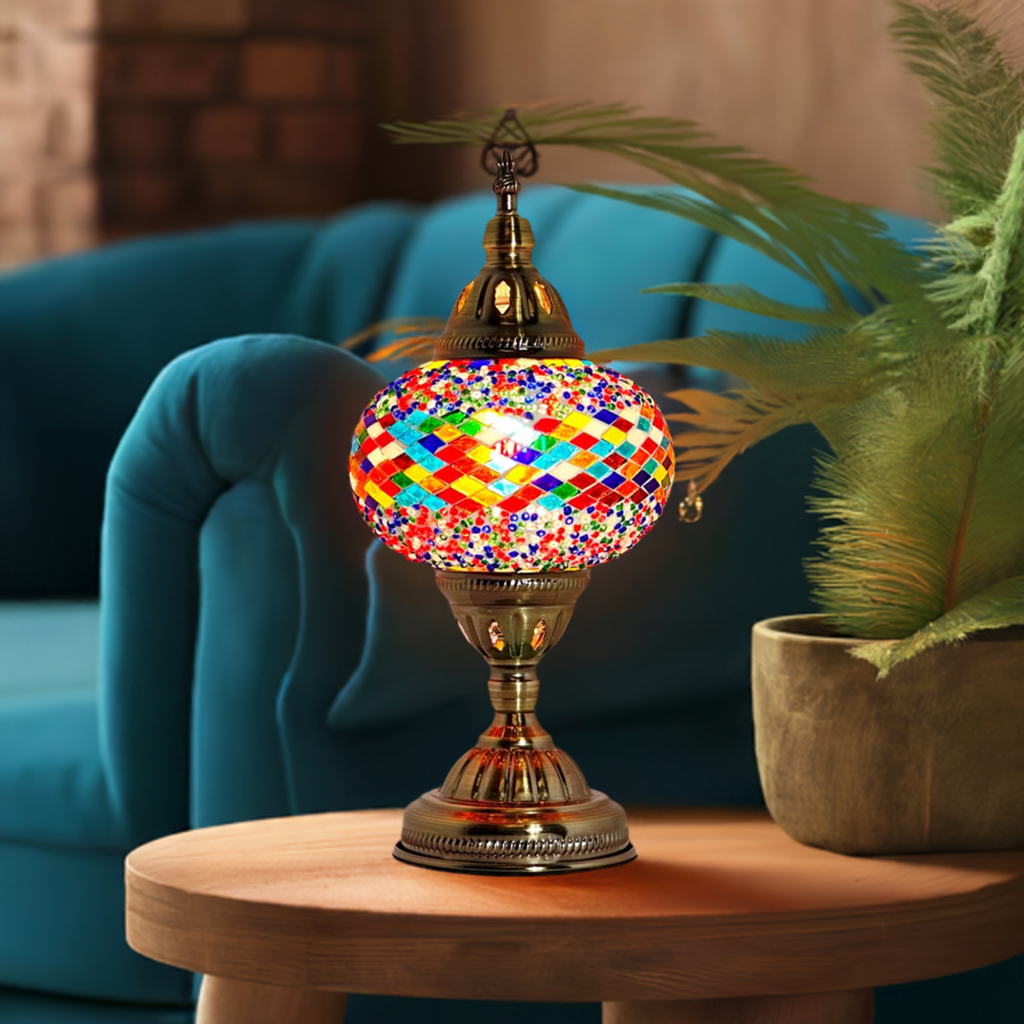 Color Spectrum mosaic glass table lamp — glowing in a styled room