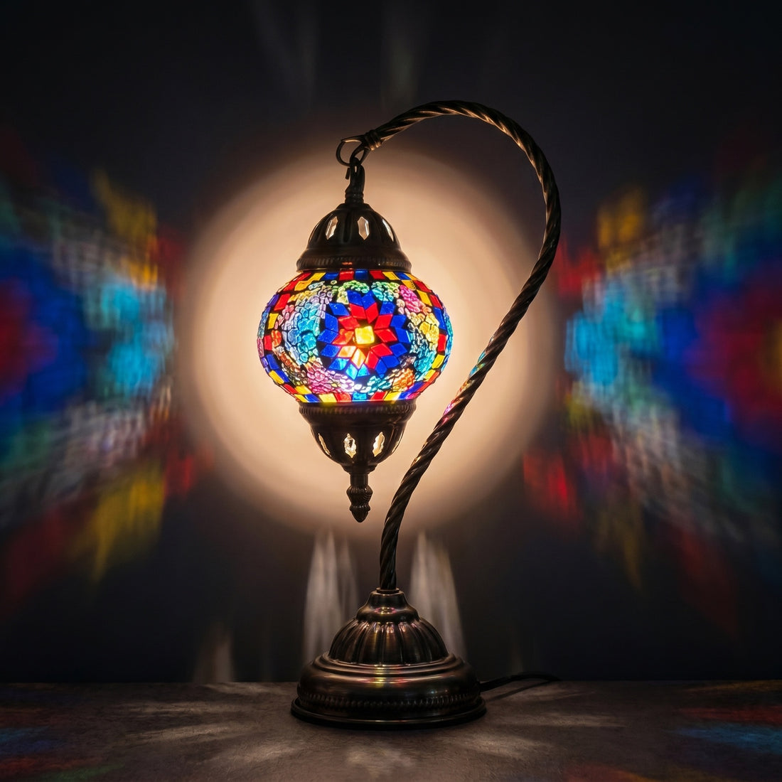 Hot Blue Turkish Mosaic Lamps with Swan Neck Style mosaic glass table lamp — glowing against a deep charcoal background