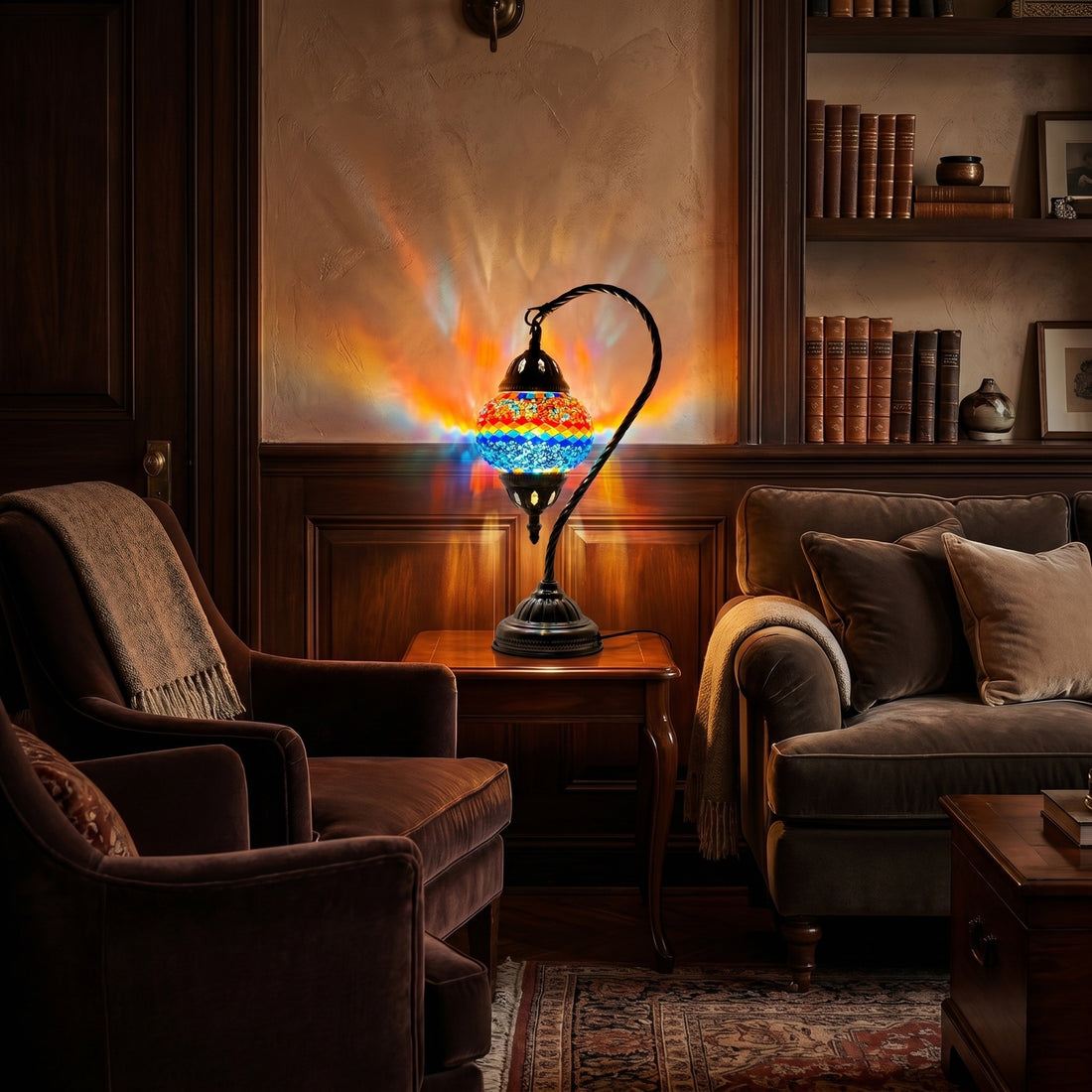 Iridescent Swan Neck mosaic glass table lamp — glowing against a deep charcoal background