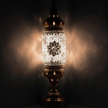 Ivory Elegance mosaic glass table lamp — glowing against a deep charcoal background
