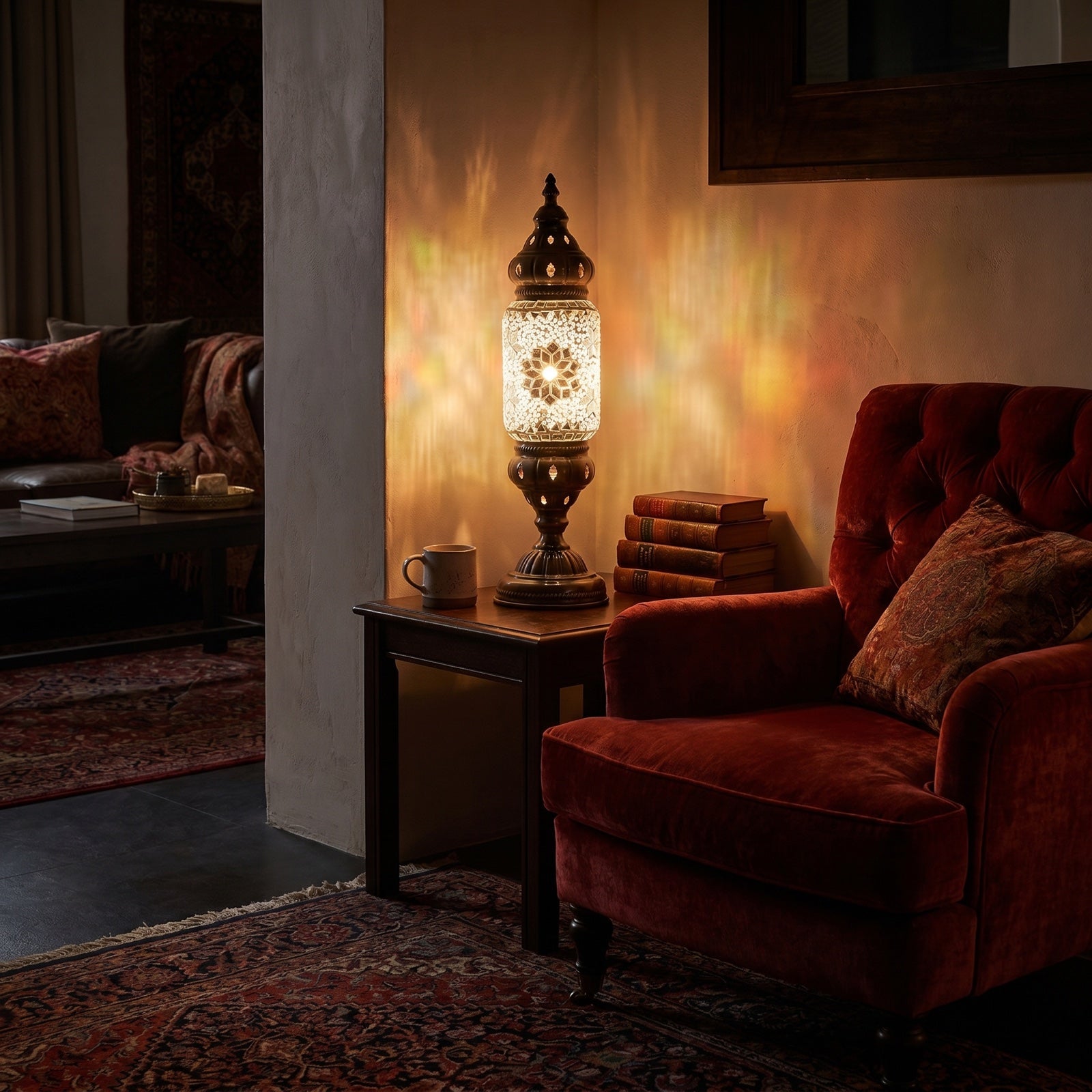 Ivory Elegance mosaic glass table lamp — glowing in a warm, dimly-lit evening room