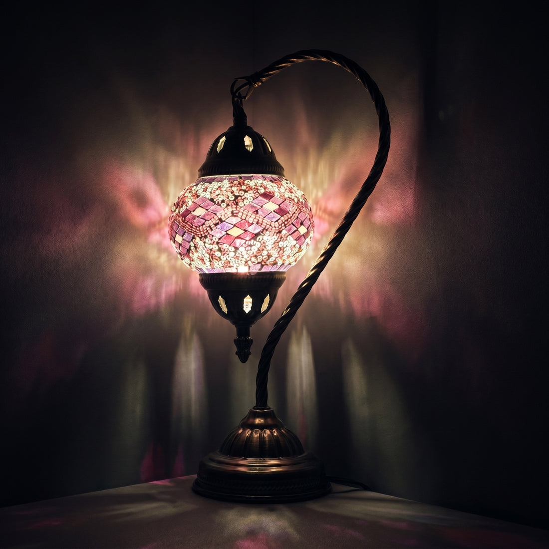 Lavender Whisper mosaic glass table lamp — glowing against a deep charcoal background