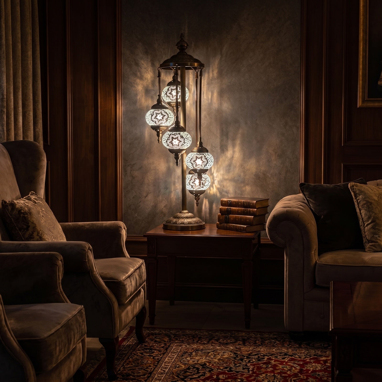 Lunar Glow mosaic glass table lamp — glowing in a warm, dimly-lit evening room