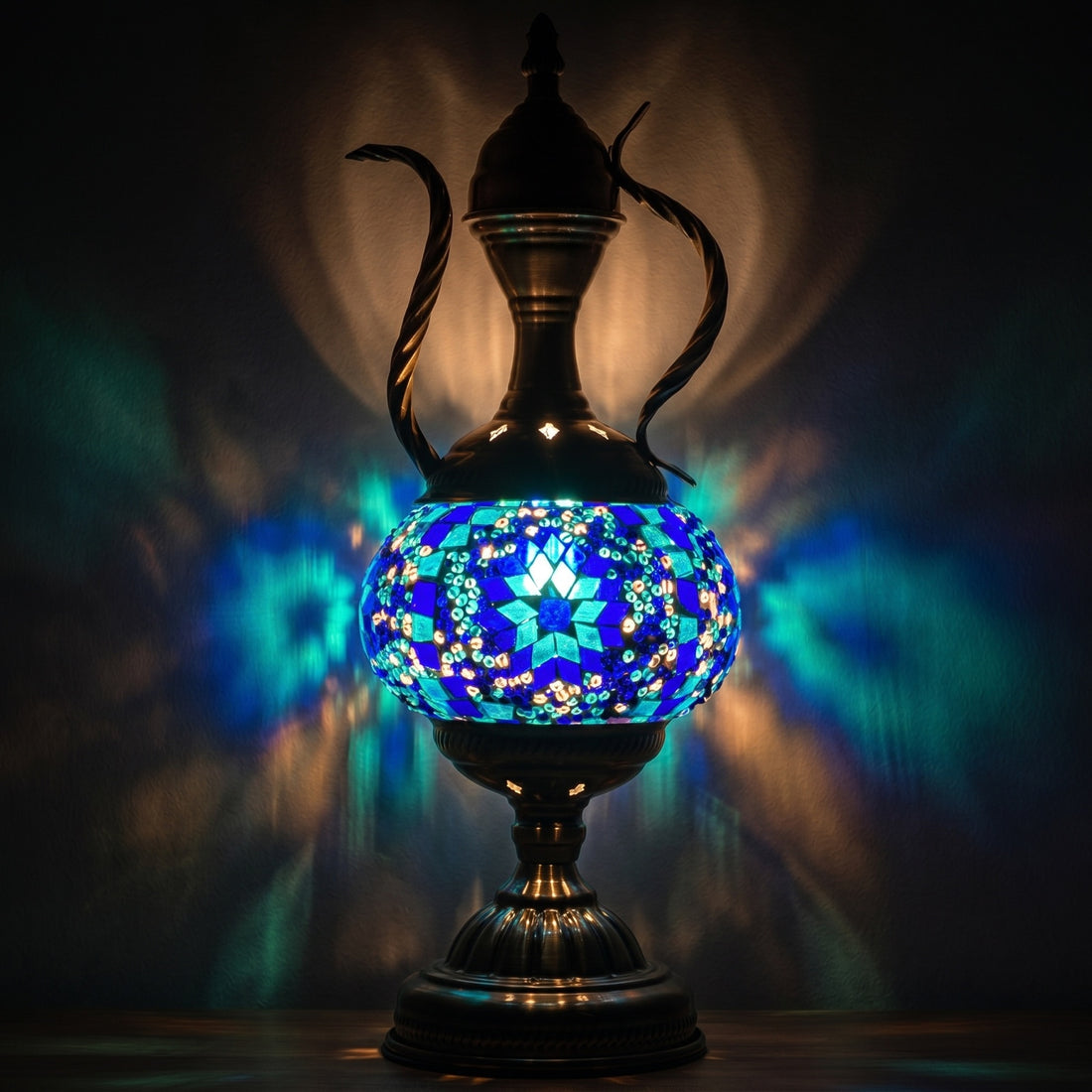 Midnight Blue Turkish Lamp with Pitcher Design mosaic glass table lamp — glowing against a deep charcoal background