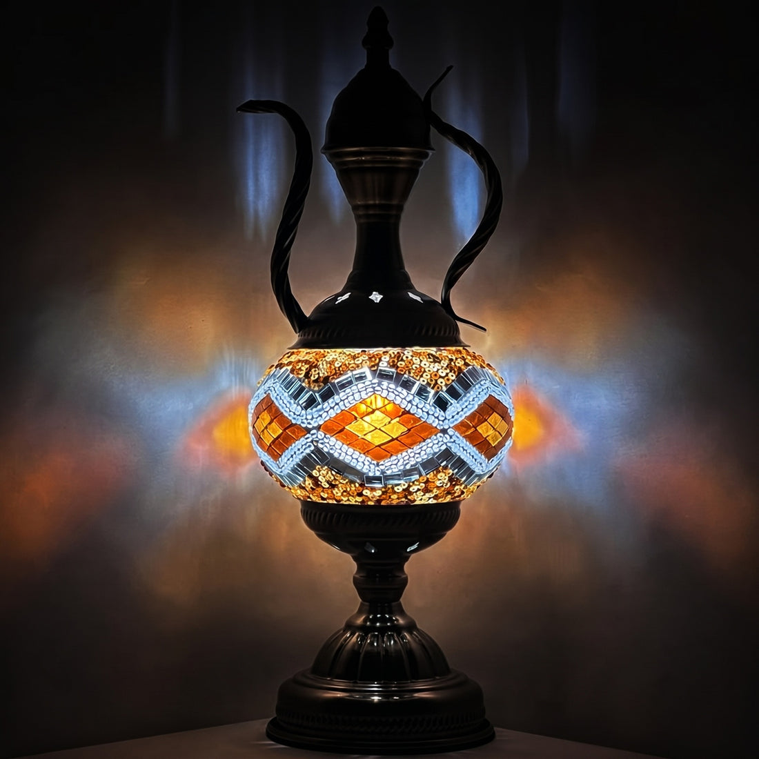 Moroccan Golden Diamonds Teapot Lamp with Vintage Charm mosaic glass table lamp — glowing against a deep charcoal background