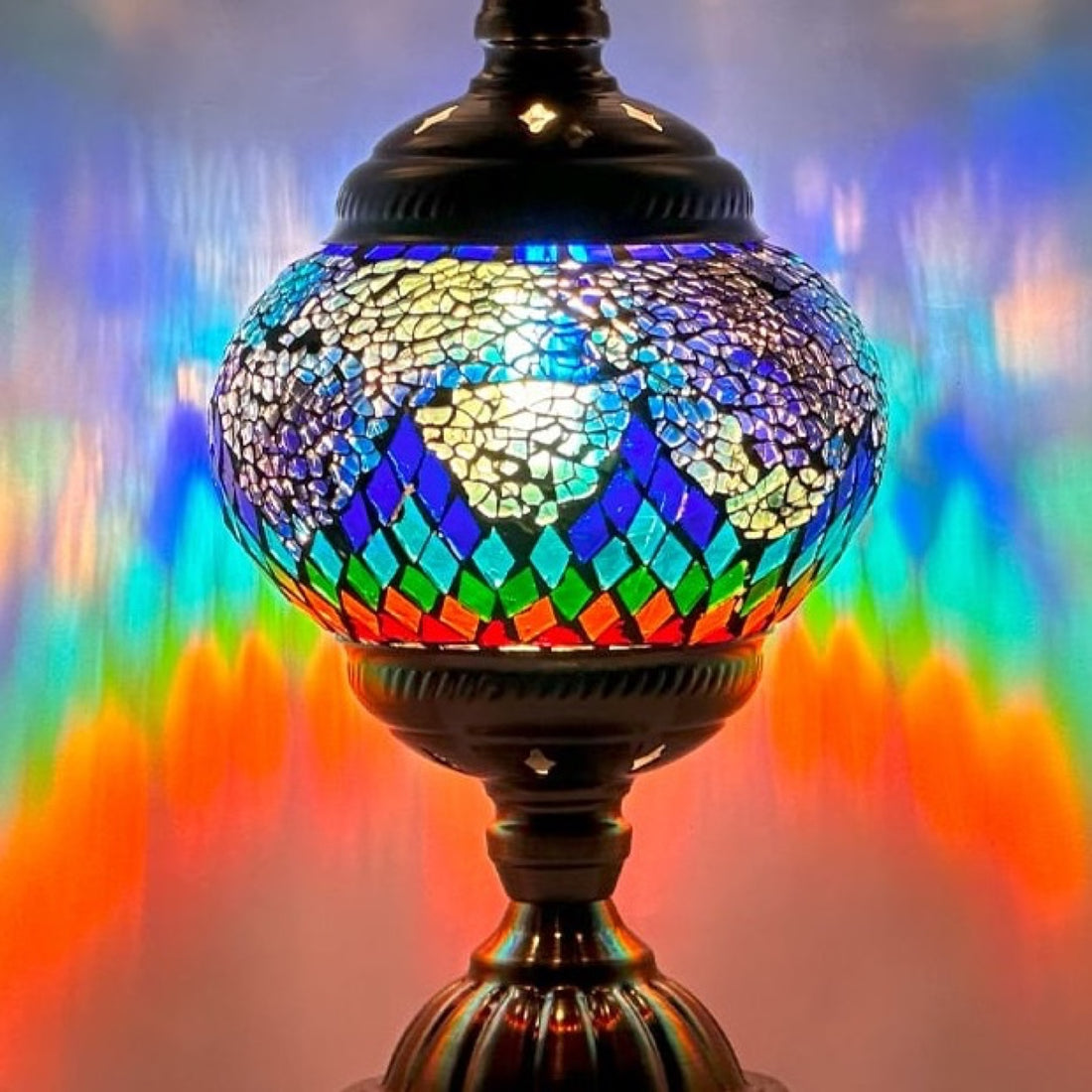 Mosaic Lamp with Blue Rainbow colors mosaic glass table lamp — glowing against a deep charcoal background