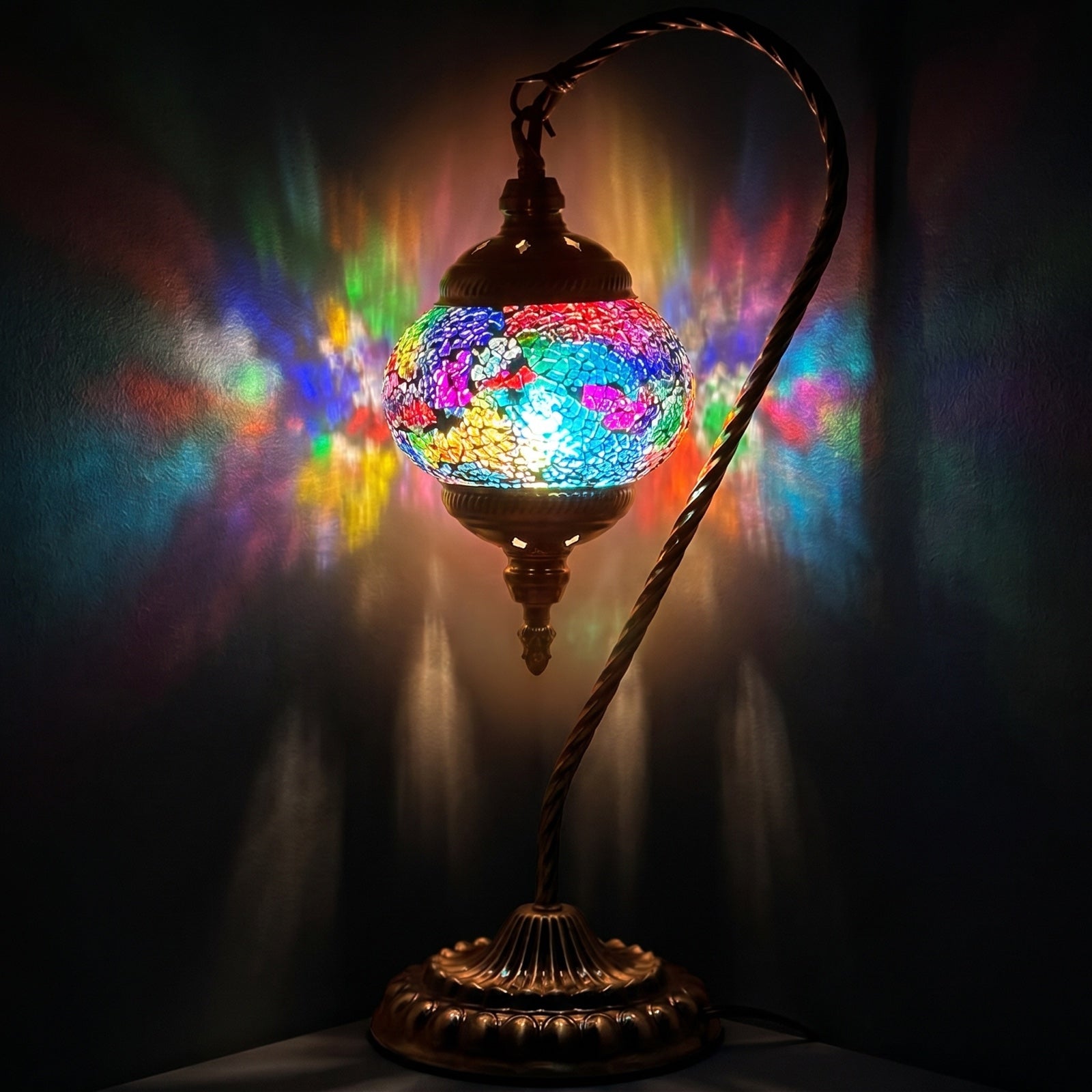 Rainbow Clouds Swan Neck Moroccan Mosaic Lamps mosaic glass table lamp — glowing against a deep charcoal background