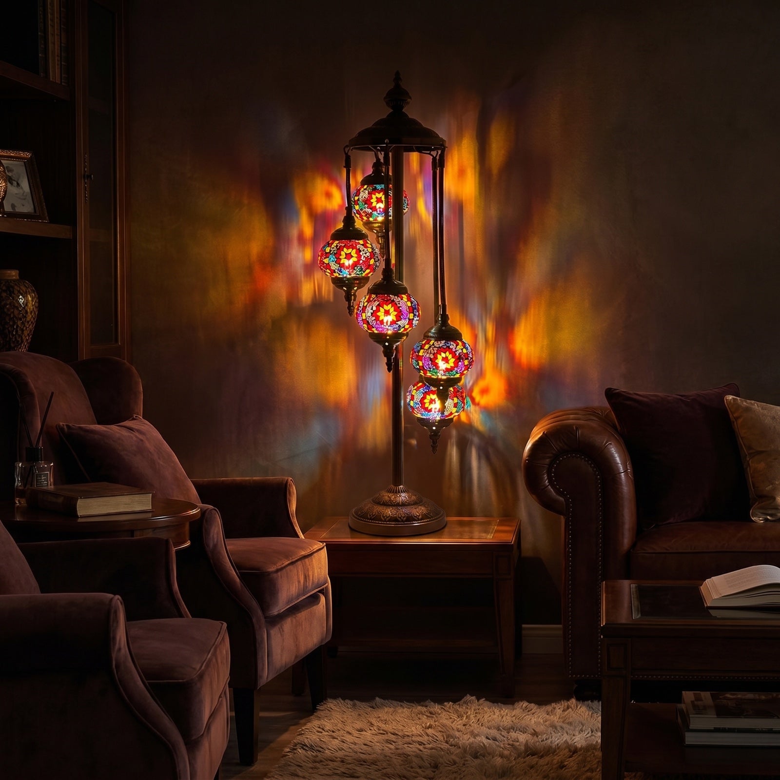 Ruby Majesty mosaic glass table lamp — glowing in a warm, dimly-lit evening room