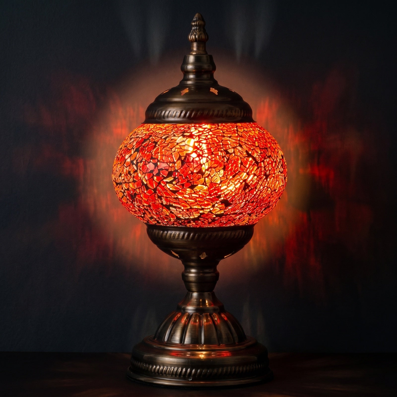 Ruby Radiance mosaic glass table lamp — glowing against a deep charcoal background
