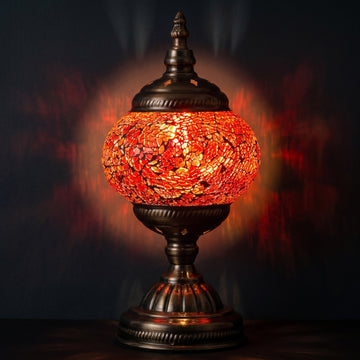 Ruby Radiance mosaic glass table lamp — glowing against a deep charcoal background