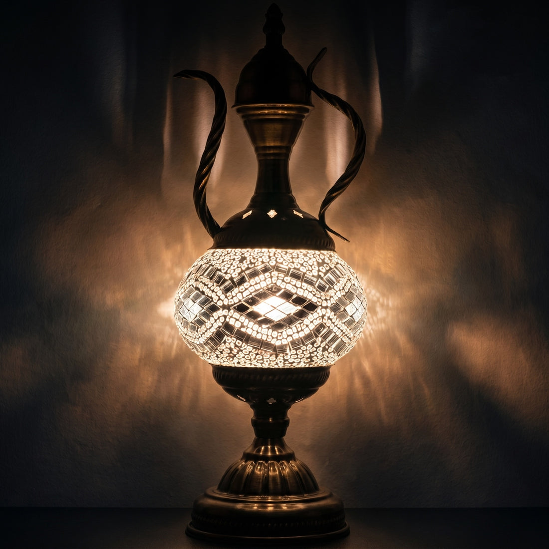 Silvery Serenity mosaic glass table lamp — glowing against a deep charcoal background
