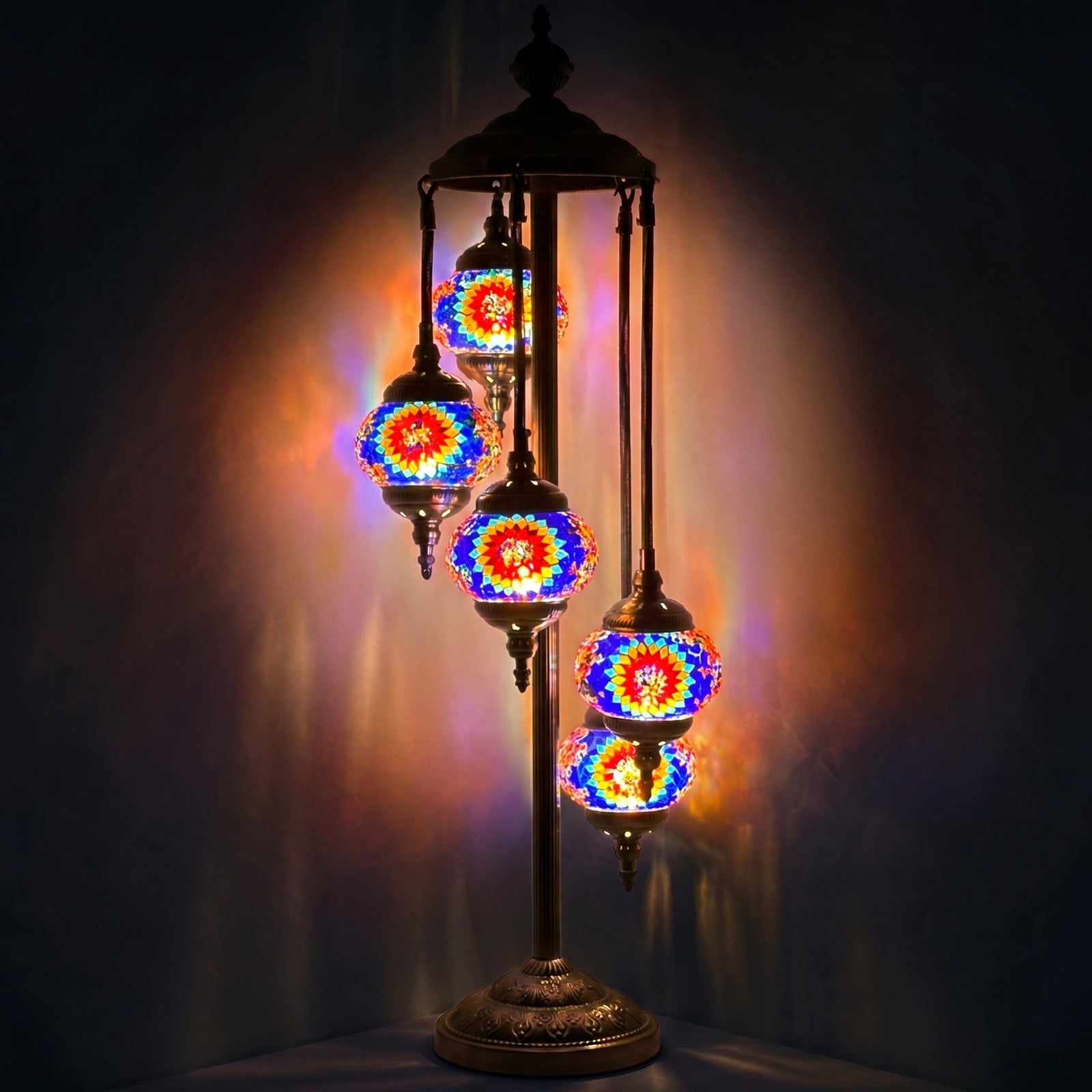 Sunflower Symphony mosaic glass table lamp — glowing against a deep charcoal background