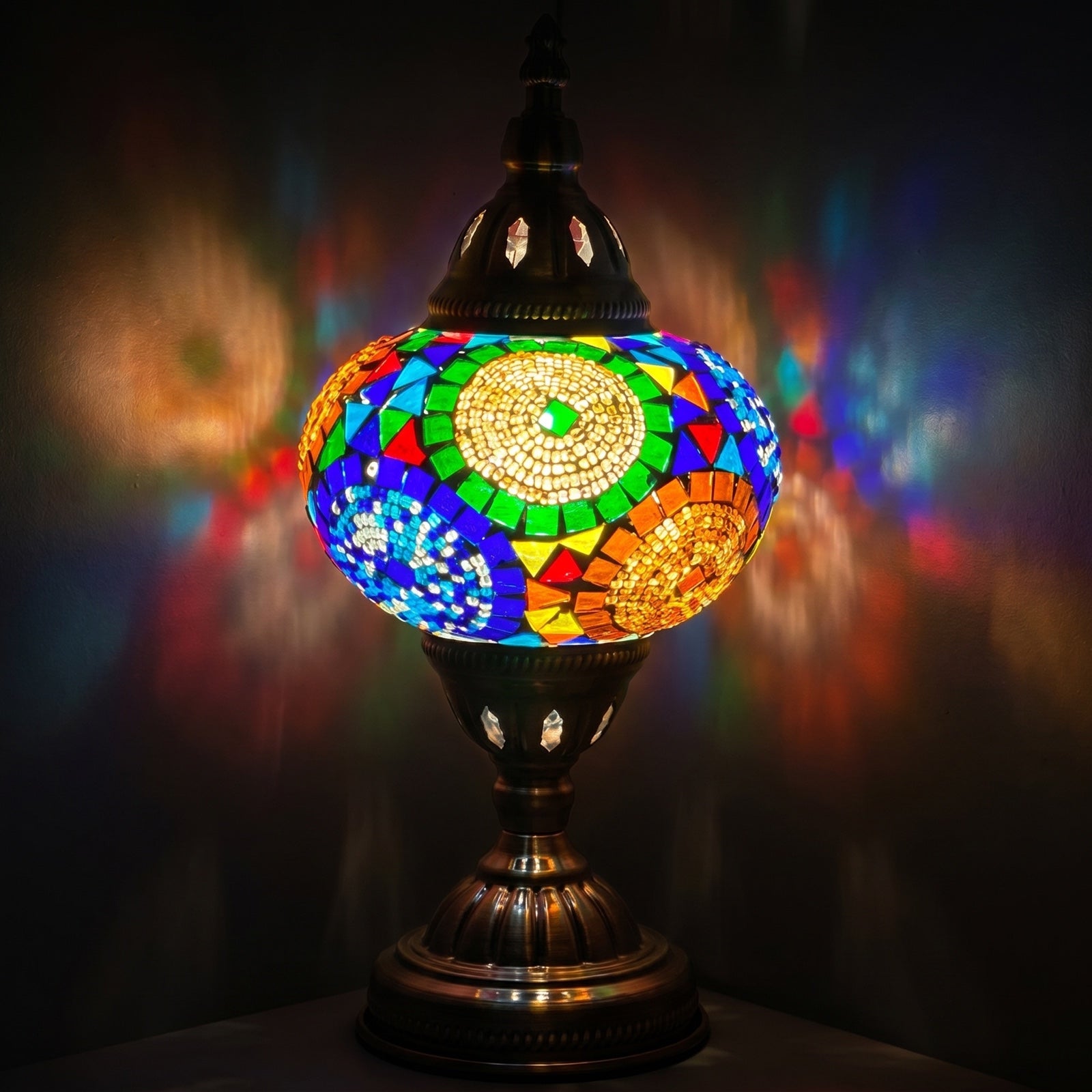 Sunflower Symphony mosaic glass table lamp — glowing against a deep charcoal background