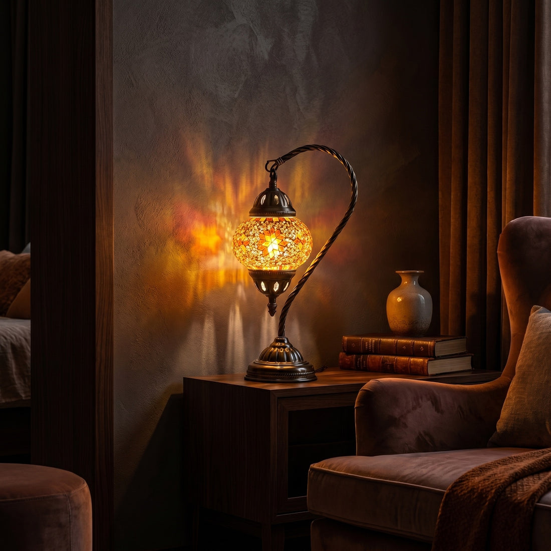 Sunset Glow mosaic glass table lamp — glowing against a deep charcoal background