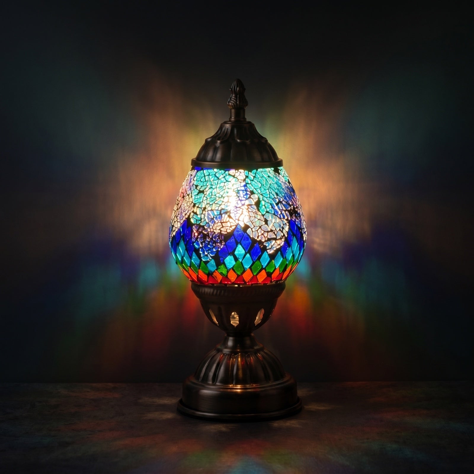 Tiffany style Lamp with Mosaic Glasses mosaic glass table lamp — glowing against a deep charcoal background