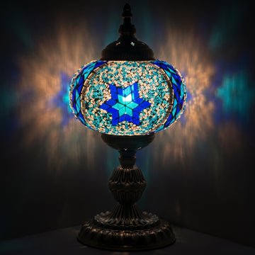 Traditional Blue Star Mosaic Turkish Table Lamp mosaic glass table lamp — glowing against a deep charcoal background