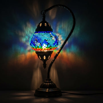 Turkish Atlantis Rainbow Lamp mosaic glass table lamp — glowing against a deep charcoal background