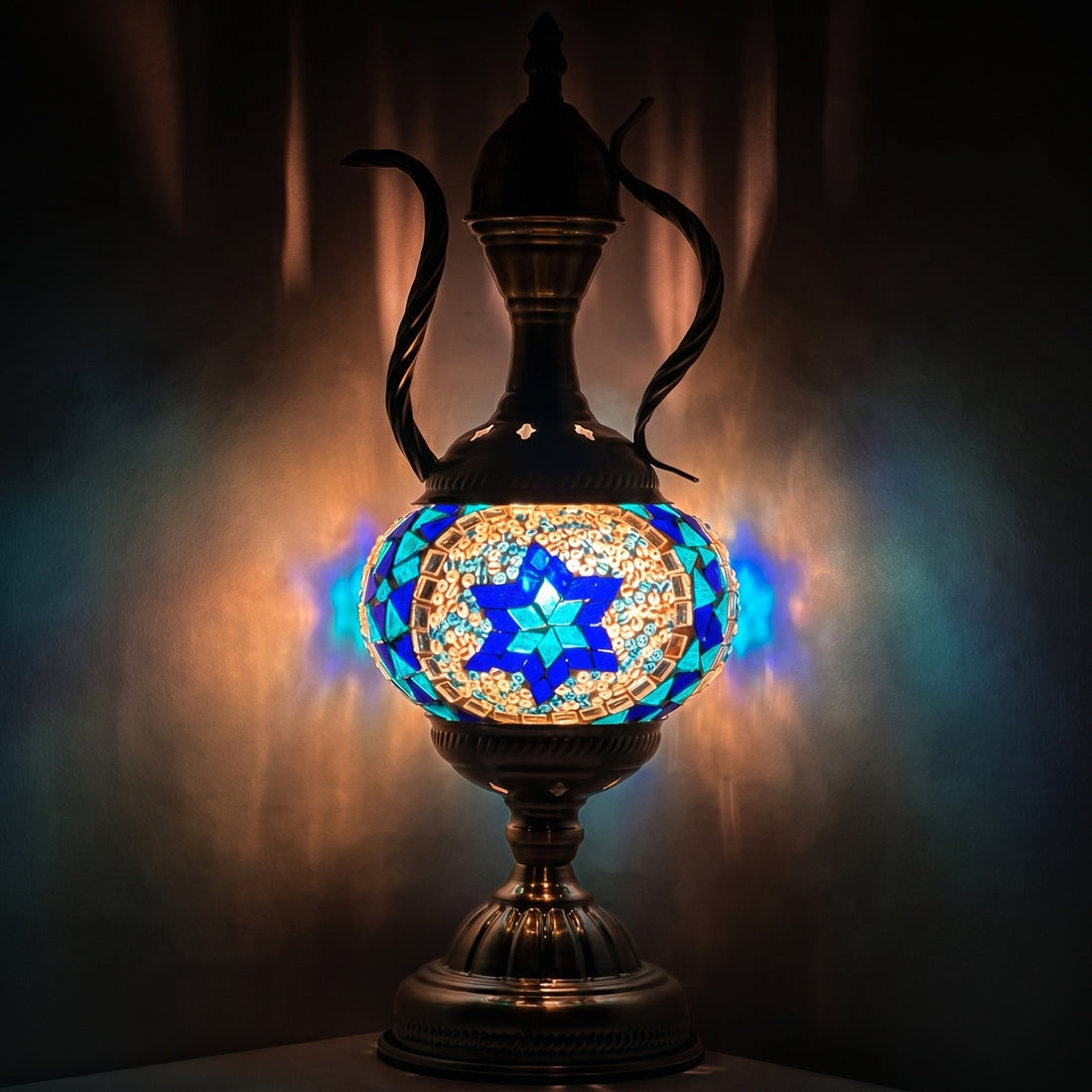 Turkish Blue Star Pitcher Lamp mosaic glass table lamp — glowing against a deep charcoal background