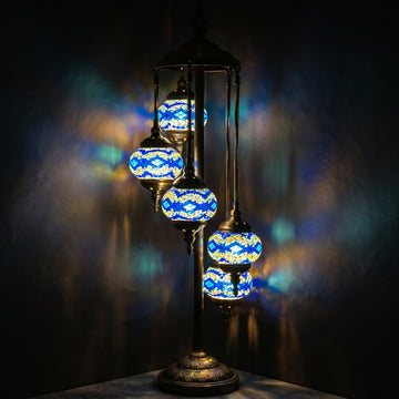 Turkish Floor Lamp with Blue Diamonds mosaic glass table lamp — glowing against a deep charcoal background