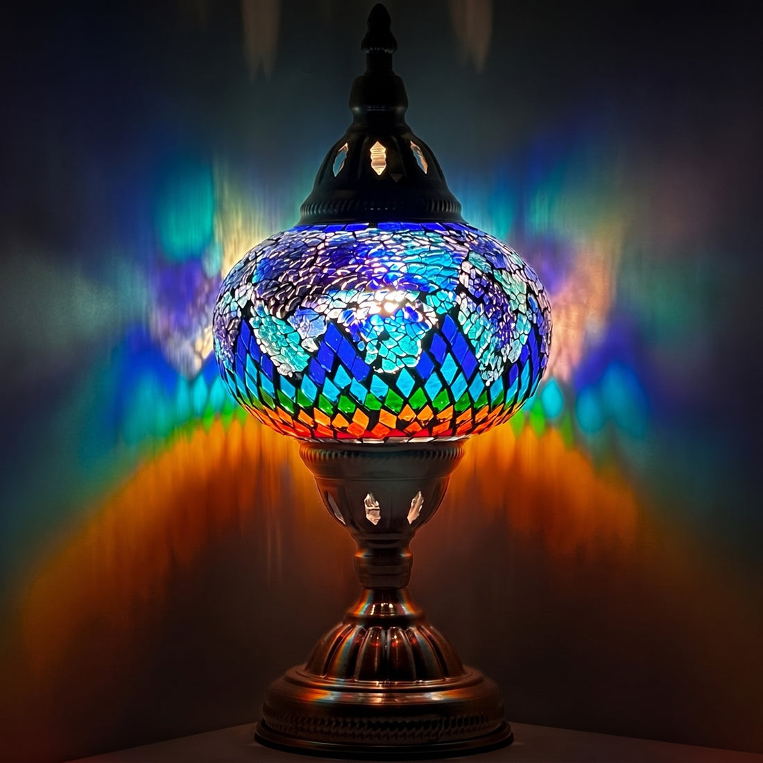 Vintage Atlantis Rainbow Mosaic Glass Lamp mosaic glass table lamp — glowing against a deep charcoal background