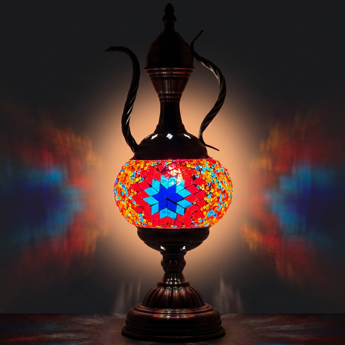 Vintage Elegance mosaic glass table lamp — glowing against a deep charcoal background
